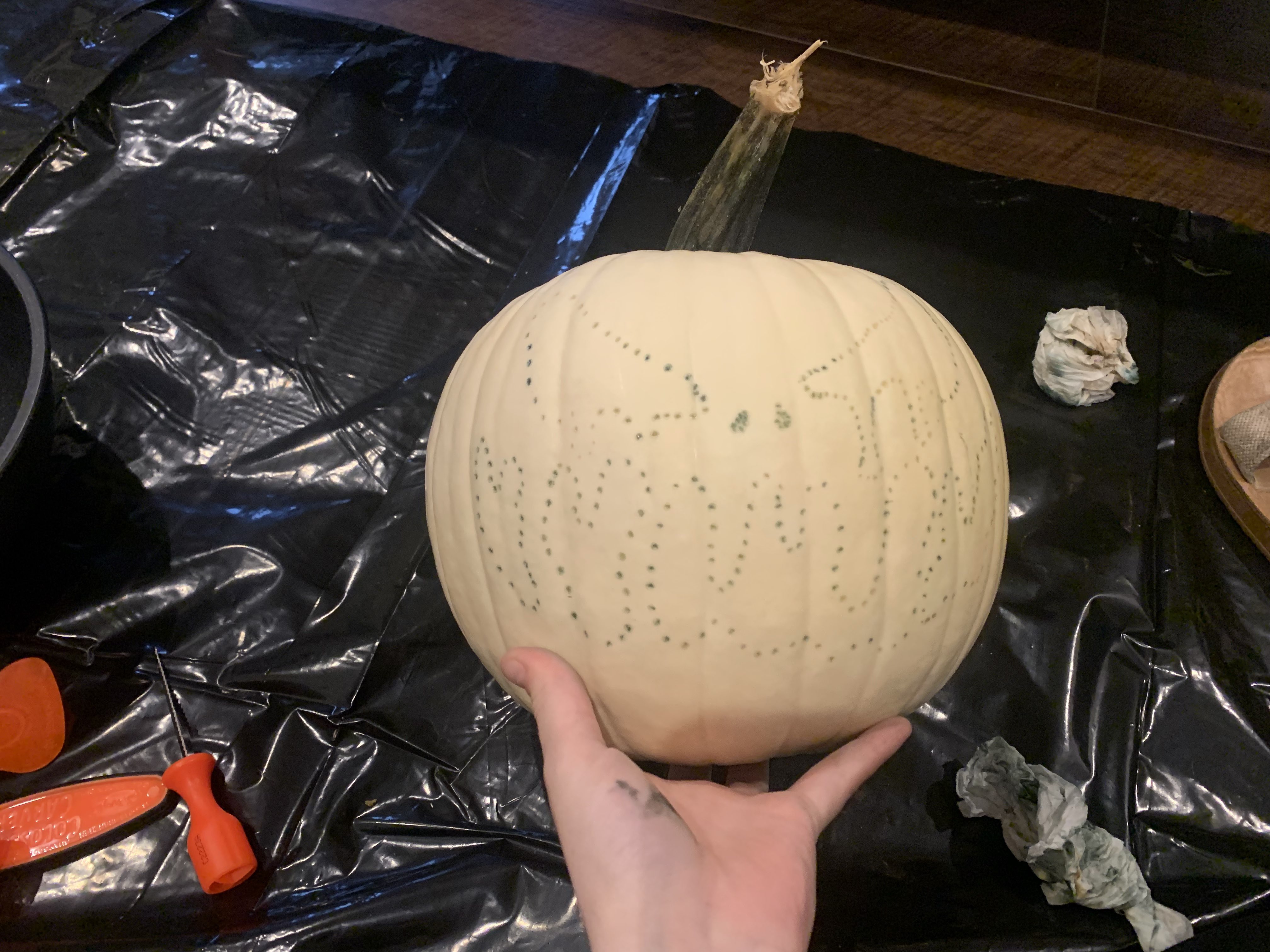 A pumpkin in the process of being carved