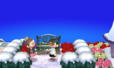 screenshot from the game ACNL picturing two mayors and a bench with snow on it with red, white, and pink roses